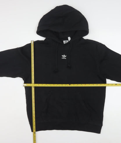 Back view of Adidas women’s black hoodie, size UK 12, pullover cotton blend casual