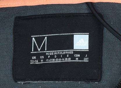 Brand and care label for Adidas women’s black medium full zip hooded sweatshirt