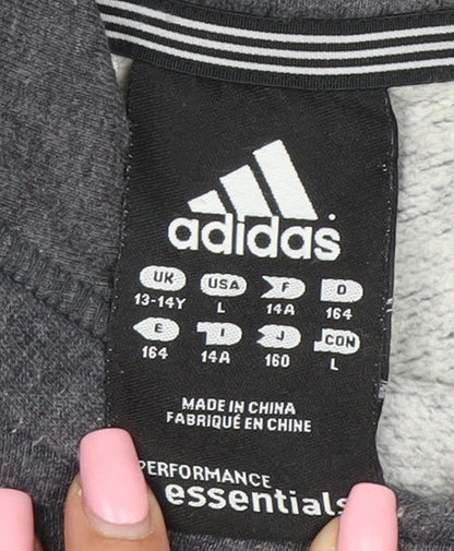 Brand and care label for Adidas boys’ grey pullover hoodie 13-14 years performance essentials