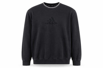 Front view of adidas boys’ black golf pullover sweatshirt, size L, crew neck embroidered logo