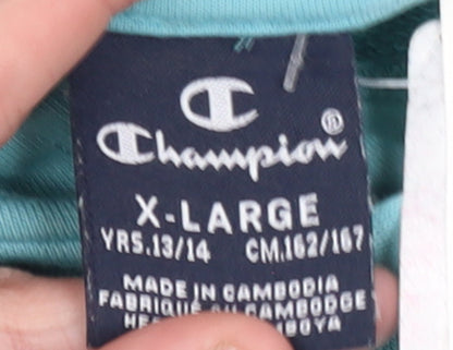 Brand and care label for Champion girls’ blue pullover hoodie, size 13-14, years regular fit