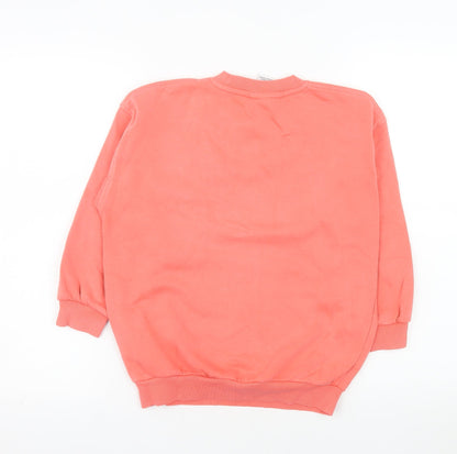 Close-up detail of Nike girls’ pink crew neck pullover sweatshirt, size S, 128-137cm