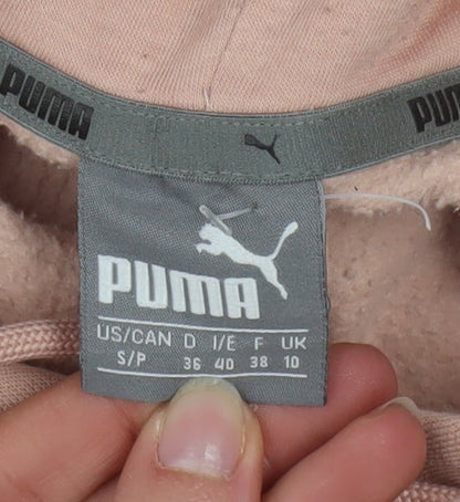 Brand and care label for Puma women’s pink pullover hoodie, size UK 10, cotton blend
