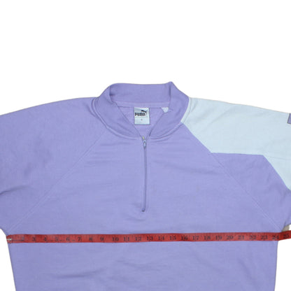 Close-up detail of Puma Women's Lilac 1/2 Zip Pullover Sweatshirt, size S