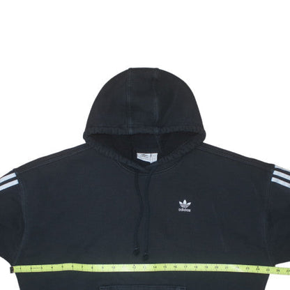 Close-up detail of Adidas women’s black pullover hoodie, size UK 8, cotton blend 3-stripes