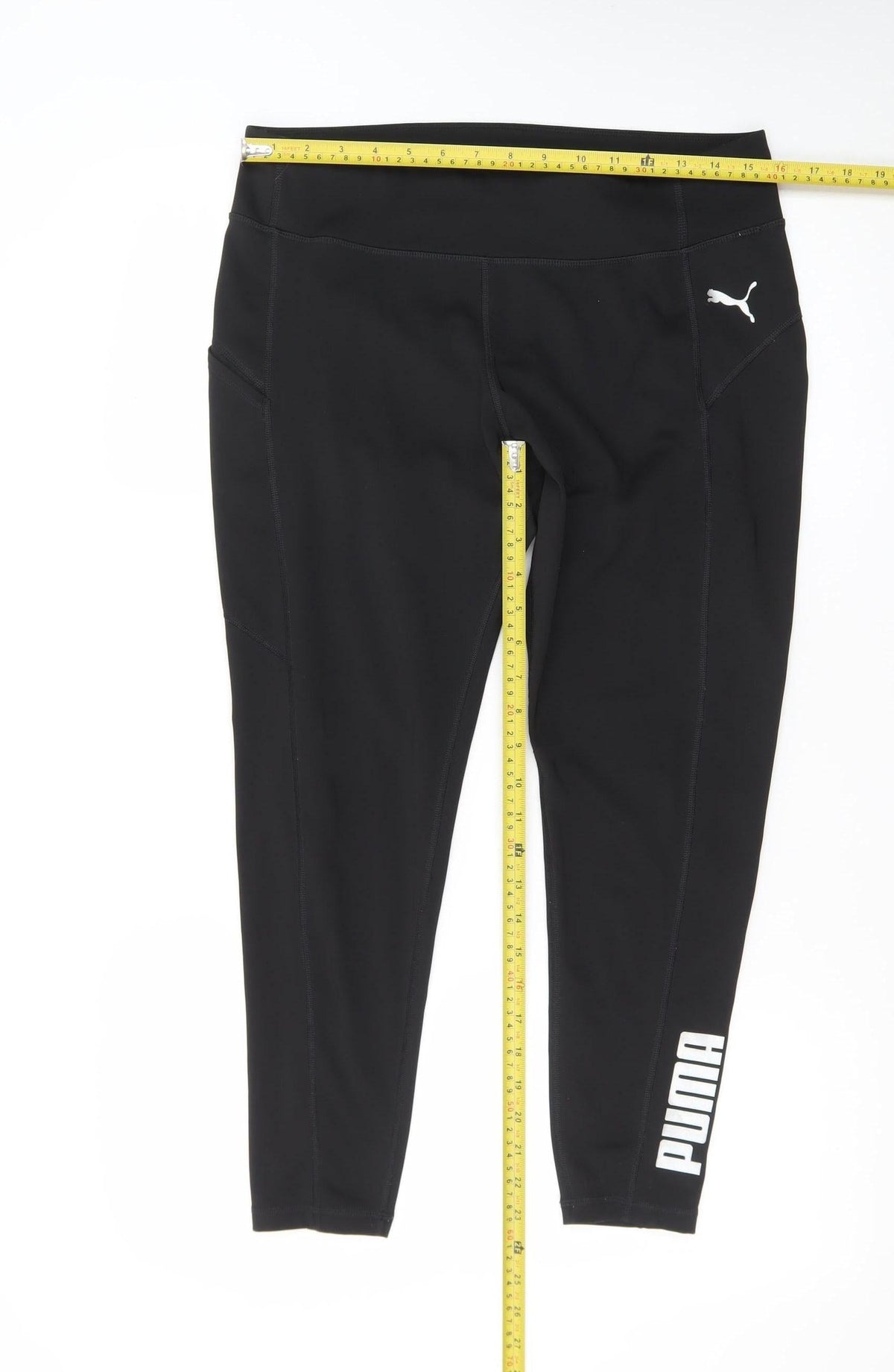 Back view of Puma women’s black l ankle leggings stretch athleisure gymwear