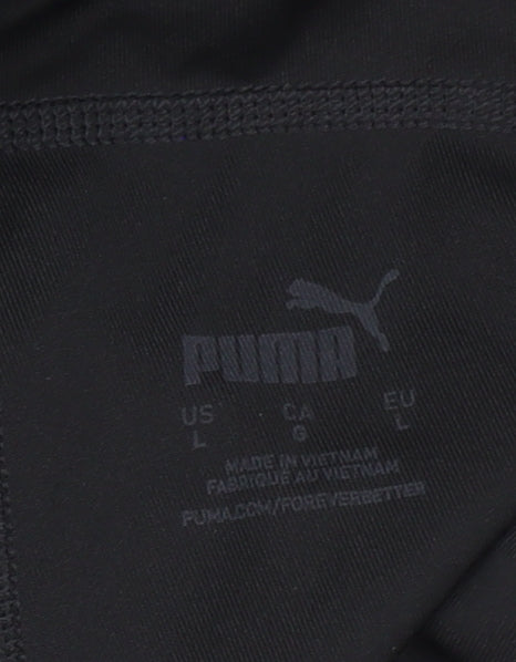 Brand and care label for Puma women’s black l ankle leggings stretch athleisure gymwear