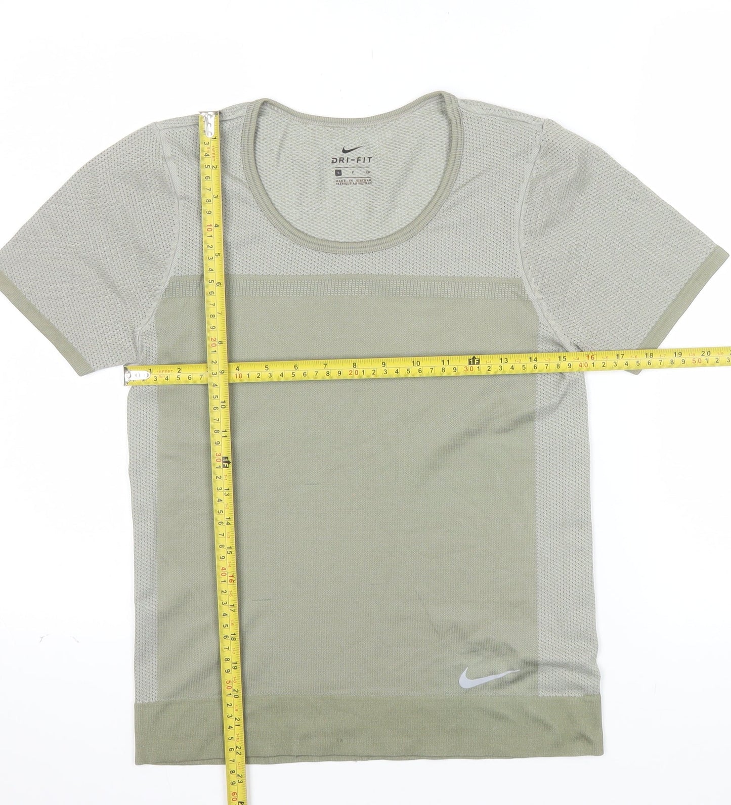 Prewornwholesale green racerback sports bra with medium support and seamless construction for activewear.