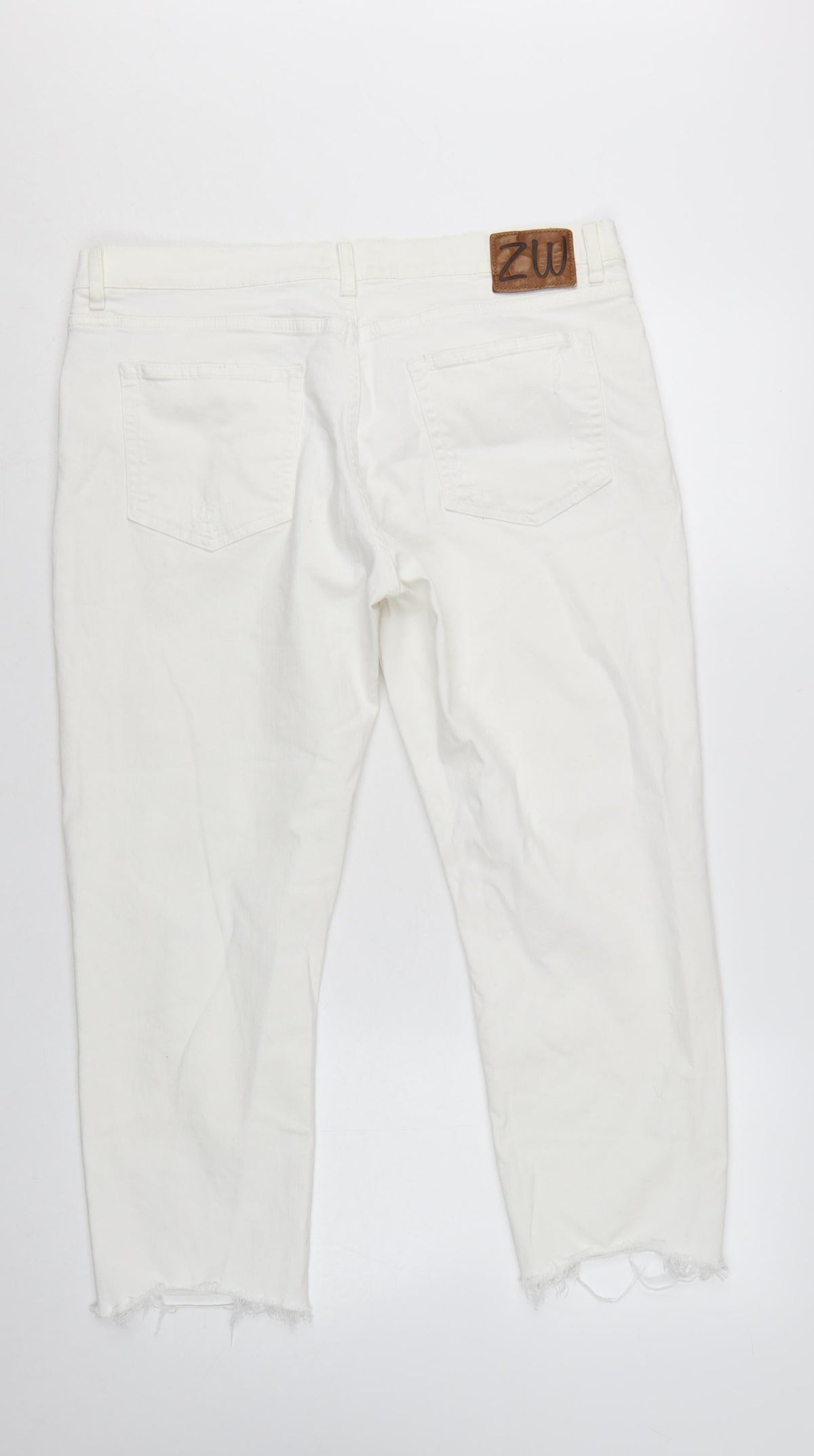 Close-up detail of Zara Woman White Distressed Boyfriend Jeans, size 14