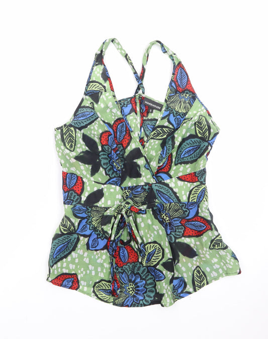 Prewornwholesale green racerback sports bra with medium support and seamless construction for activewear.