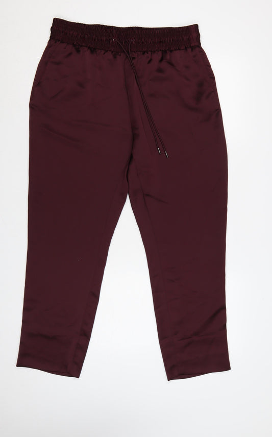 Prewornwholesale purple cropped slim fit active T-shirt with short sleeves and a high neckline.