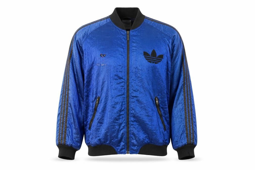 Front view of Adidas men’s blue m vintage 90s track jacket full zip