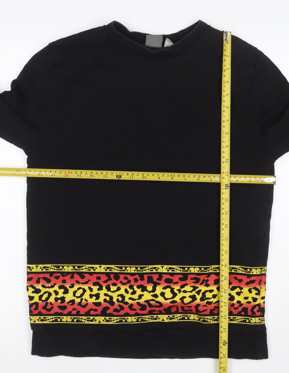 Close-up detail of ASOS Men’s Black M Crew Neck Leopard Print Pullover Sweatshirt
