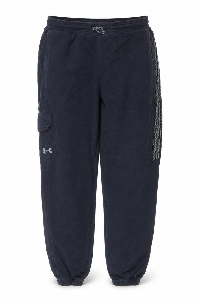 Front view of Under Armour boys’ black xl loose fit jogger track pants reflective