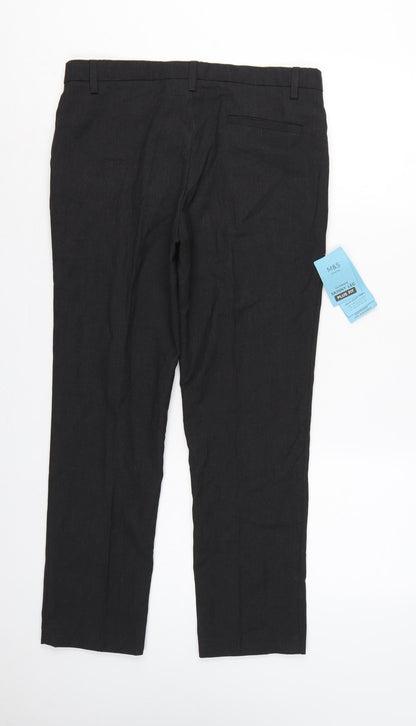 Close-up detail of Marks & Spencer boys’ black 11-12 years plus fit skinny school trousers