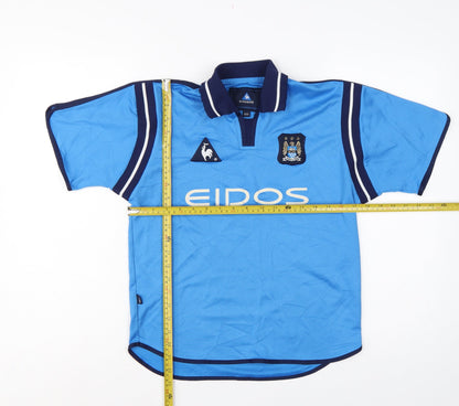 Back view of Le Coq Sportif boys’ blue 10 years polo jersey manchester city football