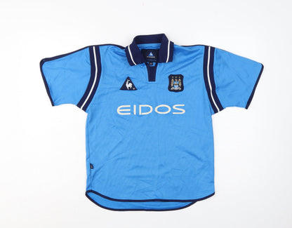 Close-up detail of Le Coq Sportif boys’ blue 10 years polo jersey manchester city football