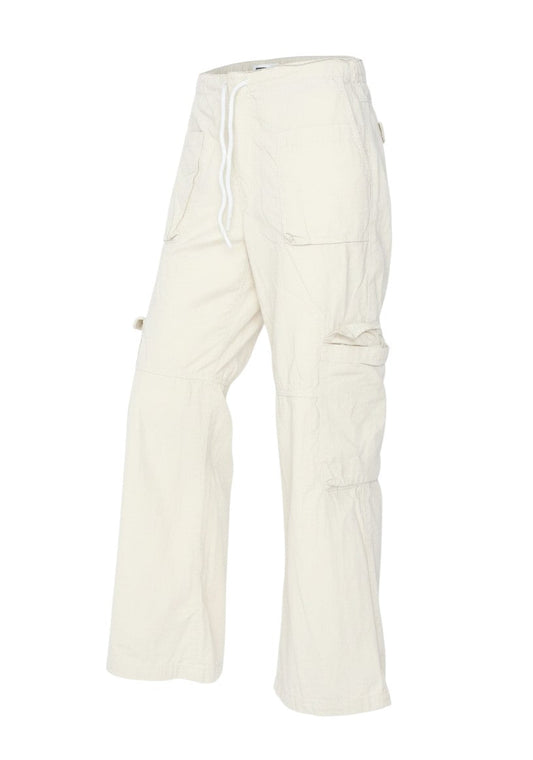 Prewornwholesale beige wide-leg cargo trousers in cotton with an elasticated waist and utility pockets.