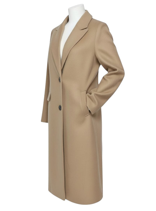 Prewornwholesale beige long polyester overcoat with a single-breasted two-button closure and classic lapel collar.