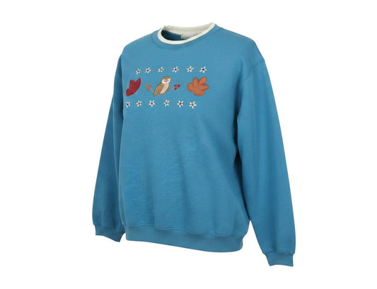 Prewornwholesale blue cotton blend pullover sweatshirt with embroidered owl and autumn leaf motif and crew neckline.