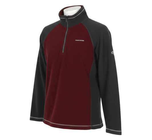 Prewornwholesale Craghoppers men's burgundy and black colour-block fleece with a quarter-zip neck and reflective trim.