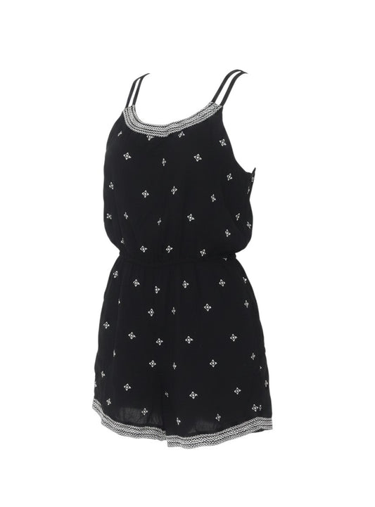 Prewornwholesale Fat Face black viscose playsuit with white embroidered motifs, adjustable straps, and geometric trim.
