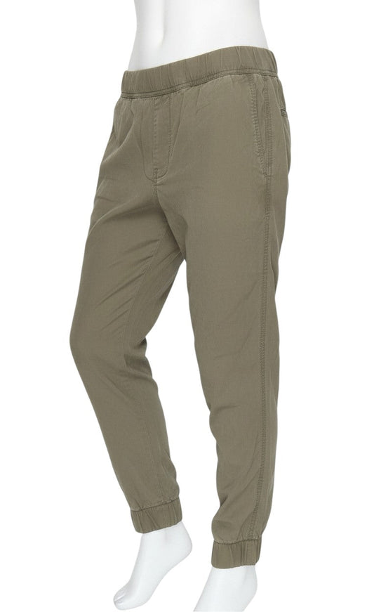 Prewornwholesale Gap women's green lyocell jogger trousers with an elastic waistband and tapered fit on a mannequin.