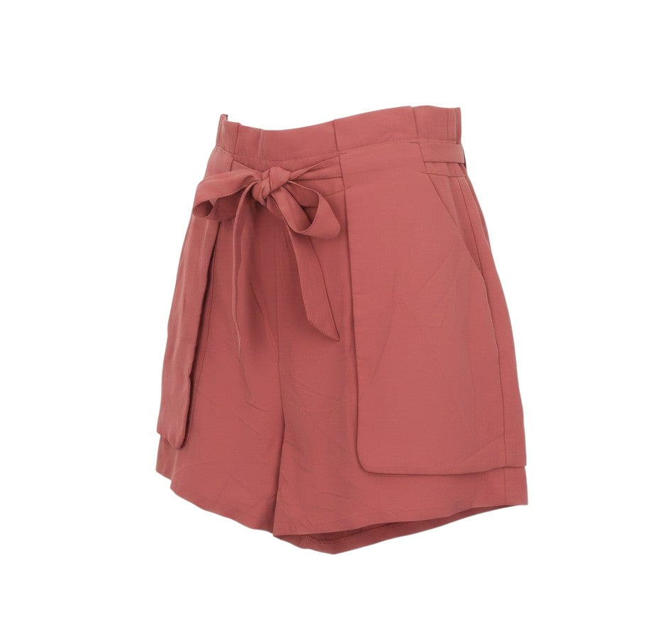 Prewornwholesale Monki red high-waisted paperbag shorts with a tie-waist belt and side pockets.