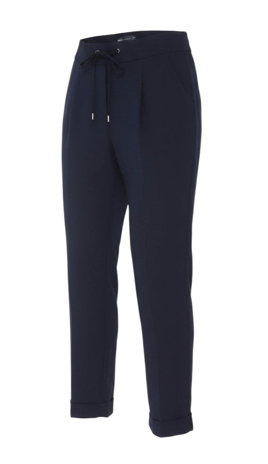Prewornwholesale Marks and Spencer navy blue tapered trousers with an elastic drawstring waist and cuffed hems.