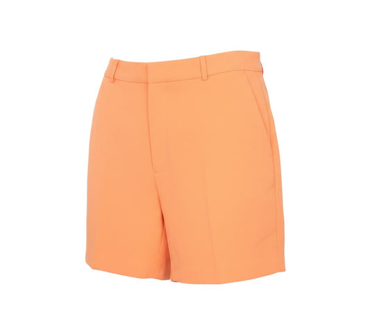 Prewornwholesale Whimsy orange high-waisted pleated shorts with belt loops and side pockets in polyester fabric.