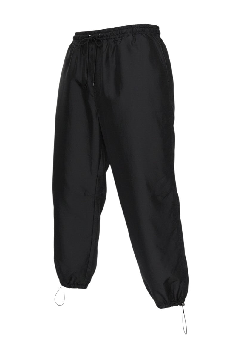 Prewornwholesale Topshop black polyester jogger trousers with elastic drawstring waist and adjustable hem ties