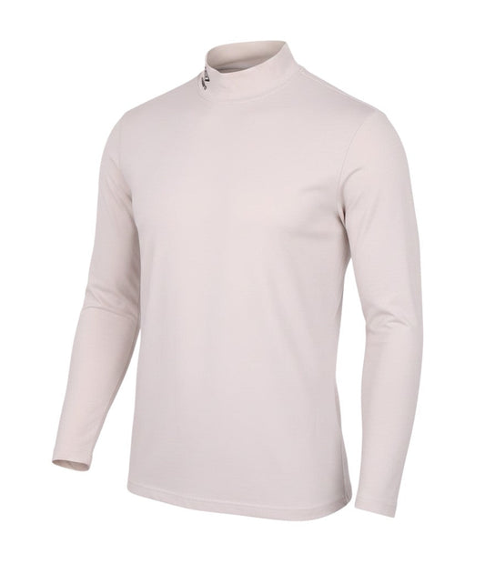 Prewornwholesale Umbro beige long sleeve activewear top with a mock neck collar and subtle branding