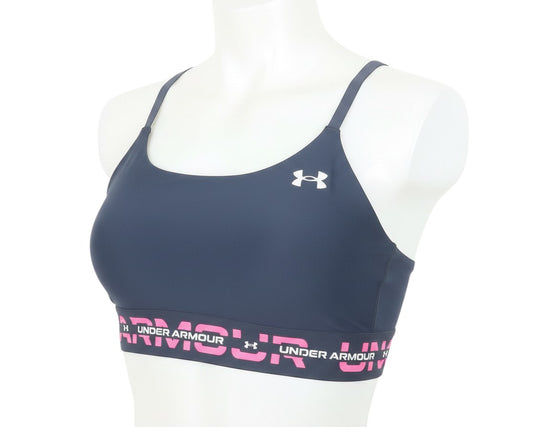 Prewornwholesale Under Armour navy blue sports bra with adjustable straps and pink logo elastic underband on mannequin