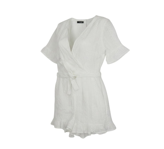 Prewornwholesale white cotton broderie anglaise playsuit with a wrap V-neck, flutter sleeves, and a tie waist belt.