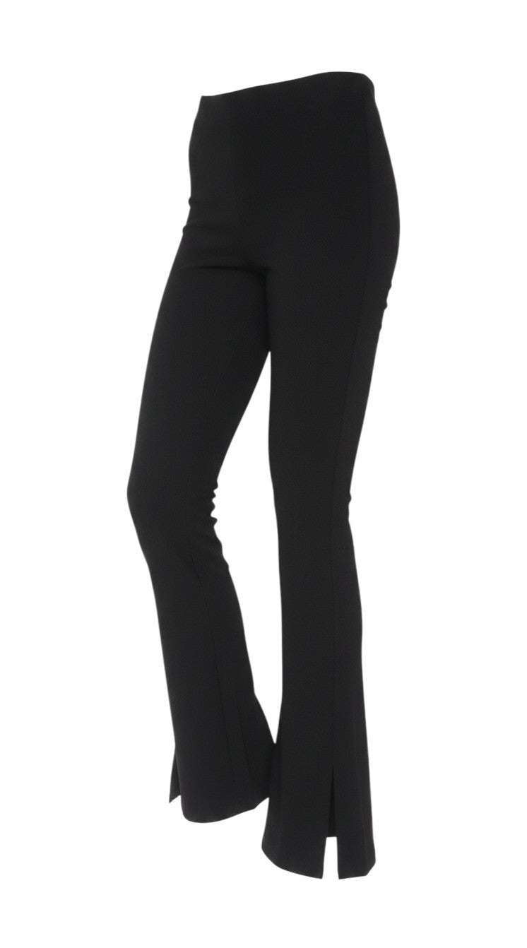 Prewornwholesale Zara women's black high-rise stretch knit flared trousers with a side slit hem detail.