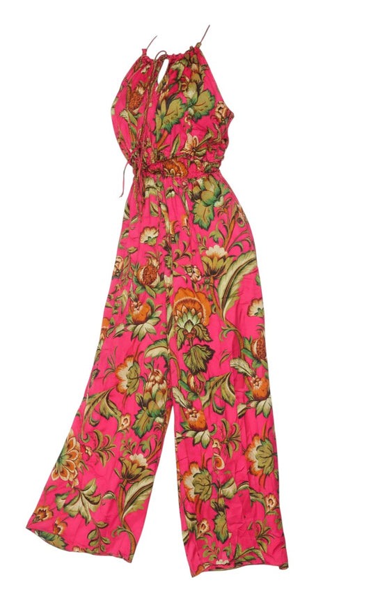 Prewornwholesale Zara hot-pink wide-leg jumpsuit featuring a tropical botanical floral print and halter-neck tie straps.